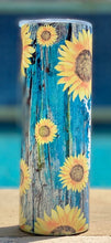 Load image into Gallery viewer, Mom Life with Sunflowers & Blue background mombun 20 oz skinny tumbler or koozie